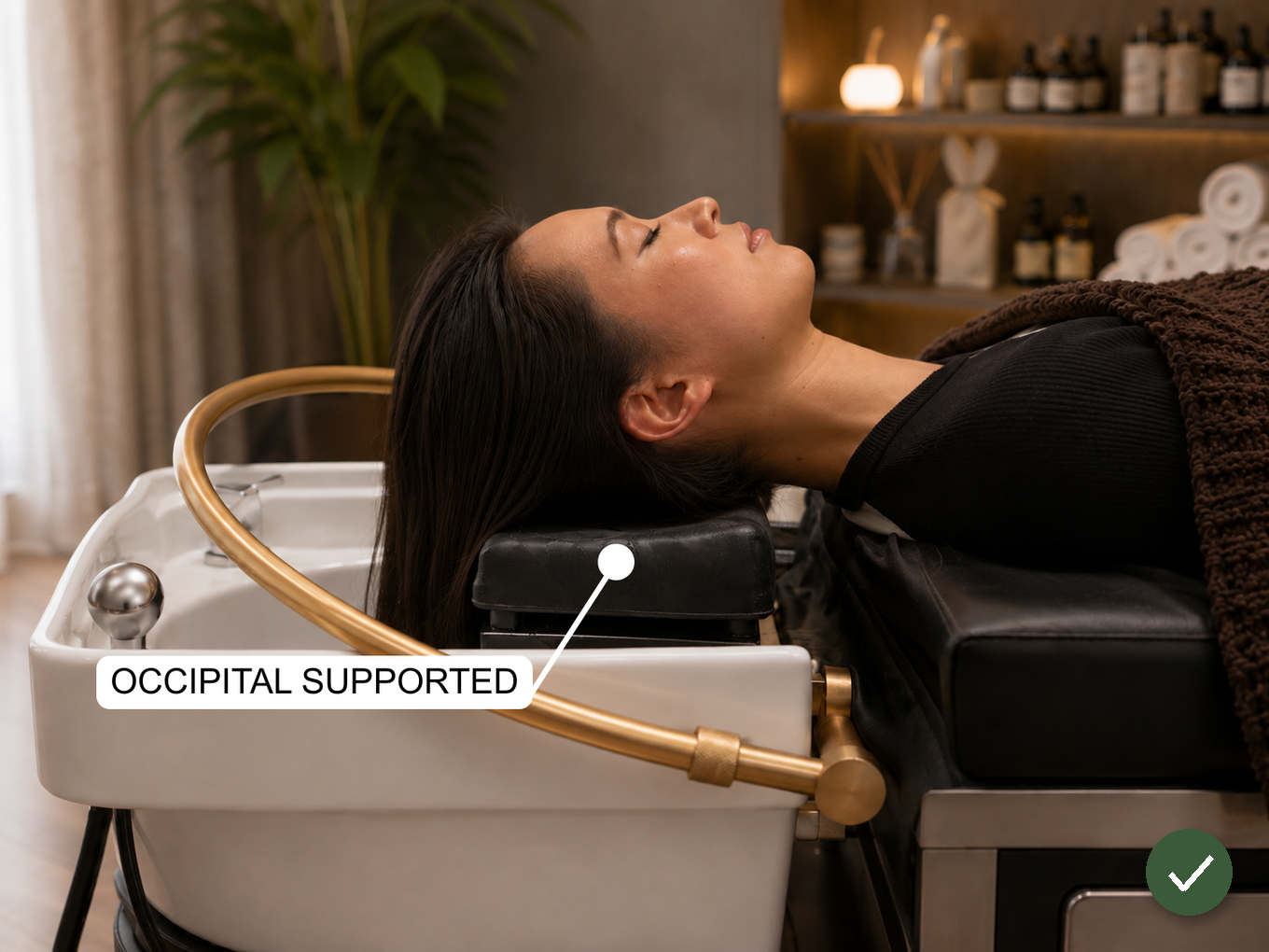 Side view of a client positioned correctly: occipital resting in the headrest's curve, neck relaxed and neutral, shoulders about 1-2 inches off the bed edge, chin level.
